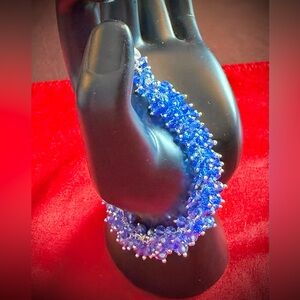 Dazzling Italian Jewelry silver-plated bracelet w/blue crystals & silver beads.